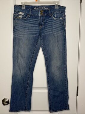 Vintage American Eagle Outfitters Women's Blue low rise Distressed Bootcut Jeans